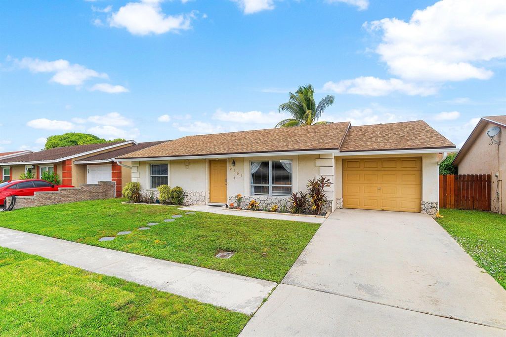 Photo of 6161 Honeywood Way, Lake Worth, FL 33463 (MLS # R11138604)