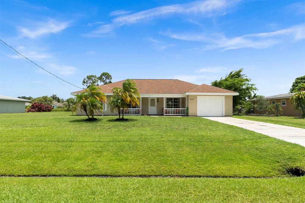 Photo of 468 SW Lakehurst Drive Dr, Port Saint Lucie, FL 34983 (MLS # R10818630)