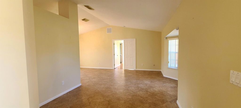 Photo of 6769 NW Abigail Avenue, Port Saint Lucie, FL 34983 (MLS # R11074052)