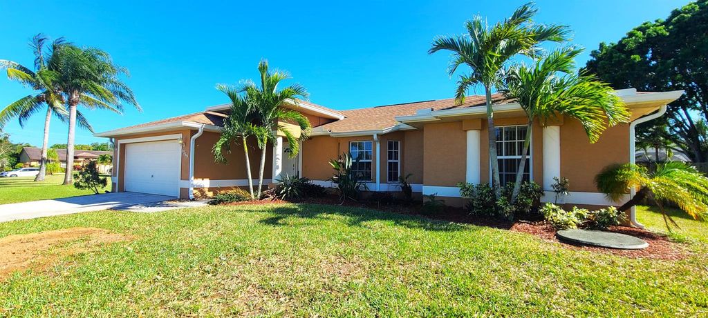 Photo of 6769 NW Abigail Avenue, Port Saint Lucie, FL 34983 (MLS # R11074052)