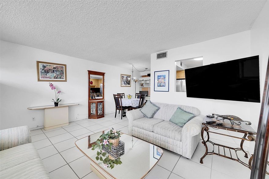 55+ COMMUNITY, UNIT IS ON THE 1st FLOOR, WELL KEPT BUILDING #102, VILLA TYPE UNIT. PRIVATE ENTRANCE FROM PATIO WITH PARKING SPOT DIRECTLY IN FRONT OF UNIT.  PICTURESQUE VIEWS FROM WINDOWS IN FLORIDA ROOM.  ALL TILE, STAINLESS STEEL APPLIANCES, UPDATED KITCHEN AND BATHROOM, NEWER WATER HEATER, GARDEN VIEW FROM PRIVATE PATIO WITH PRIVATE ENTRANCE.  IT IS LOCATED NEAR A SATELLITE YEAR-ROUND HEATED POOL, SAUNA, BILLARD, TENNIS AND PICKLEBALL COURT. GOLF COMMUNITY WITH MANY PERKS.  ALL OCCUPANTS MUST BE 55+. NO GUARANTORS PERMITTED IN THIS PHASE.  ASSOCIATION REQUIRES $2700 A MONTH NET INCOME AND 670 CREDIT SCORE.