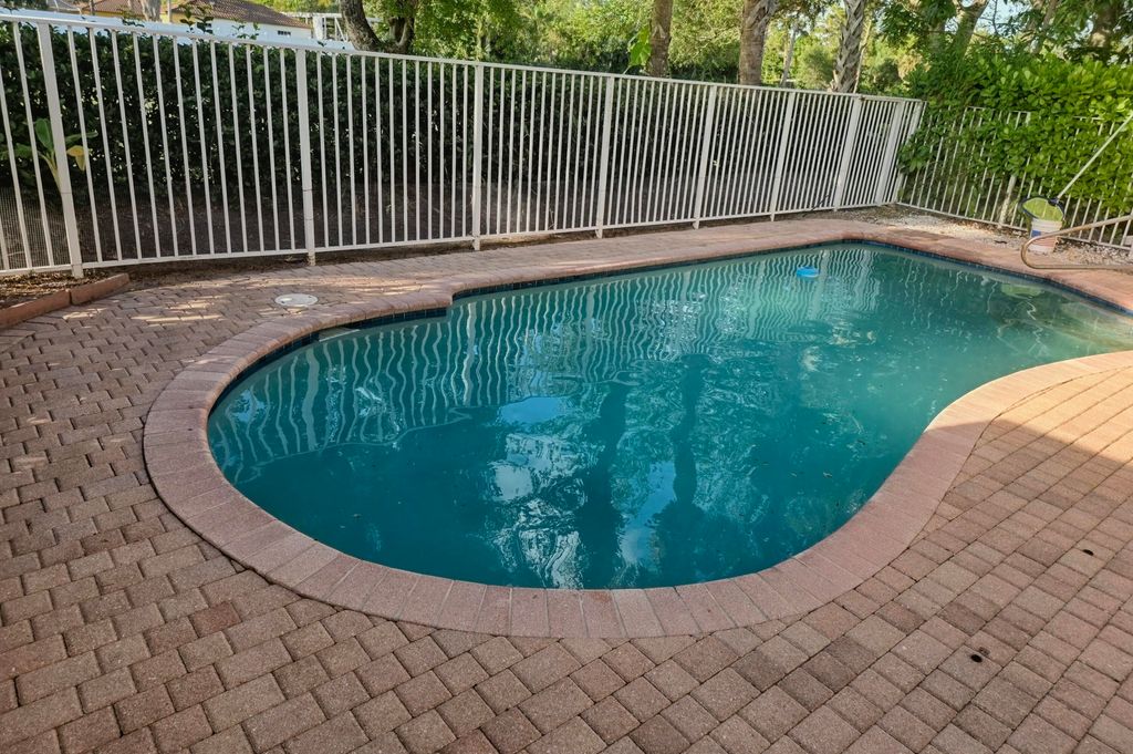 Photo of 5069 Starblaze Drive, Greenacres, FL 33463 (MLS # B26043494)