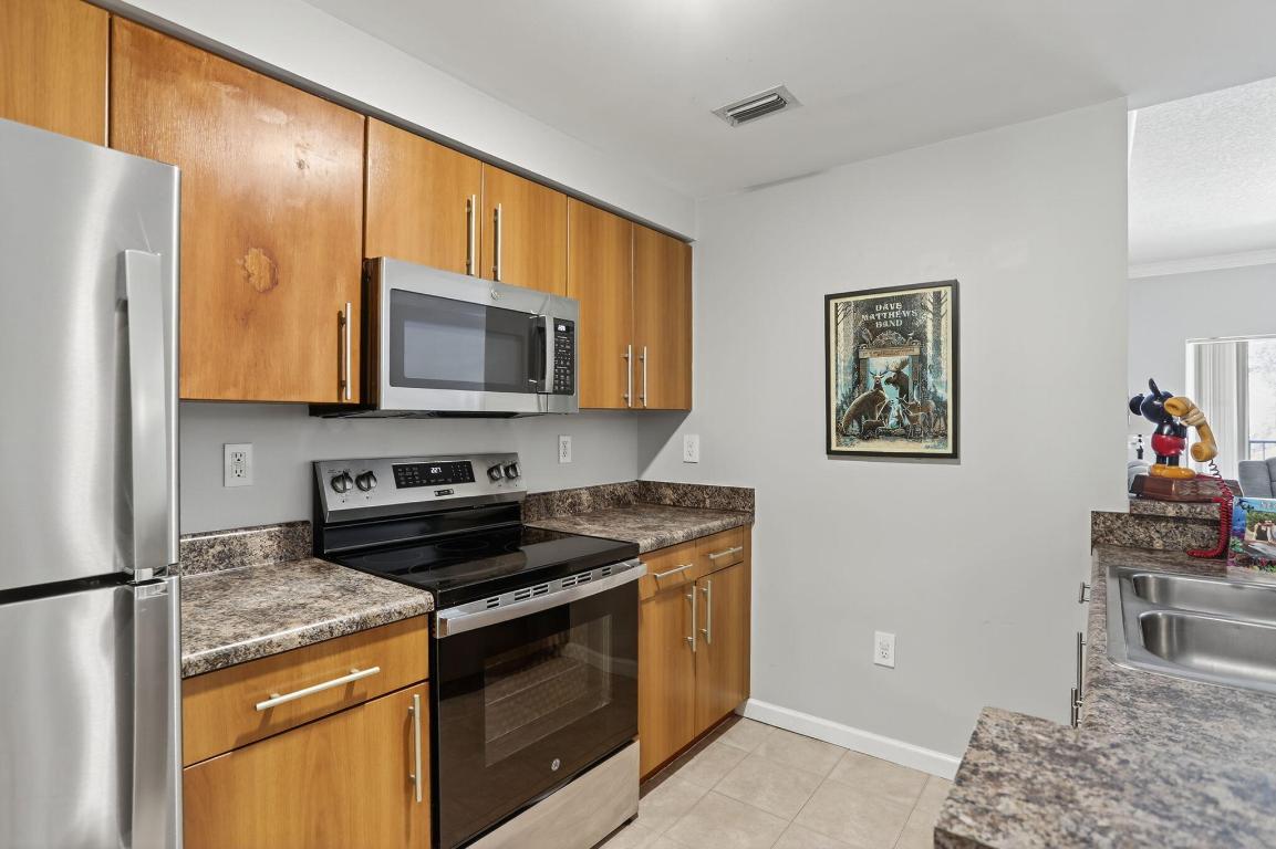 EL-AD POINCIANA CONDO - Residential