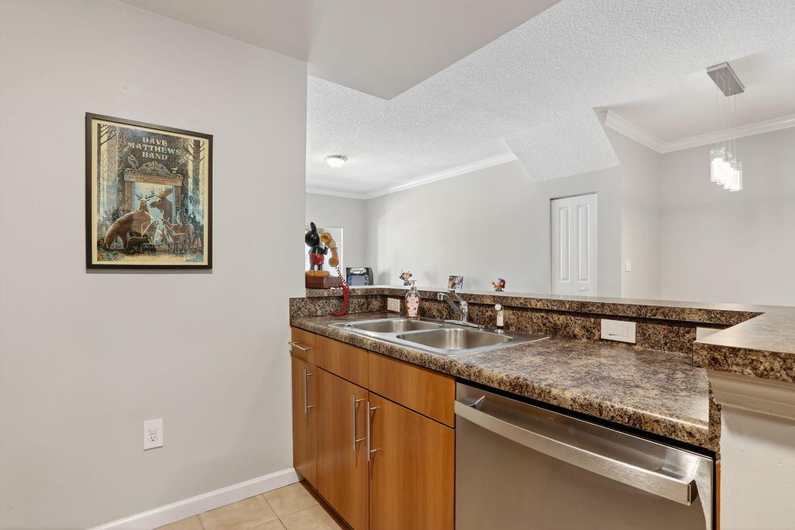 EL-AD POINCIANA CONDO - Residential