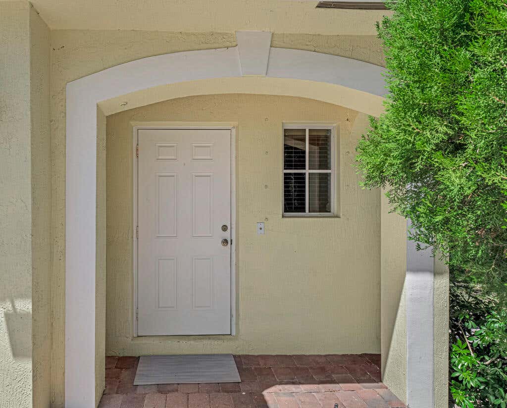 Photo of 813 Imperial Lake Road, West Palm Beach, FL 33413 (MLS # R11081485)