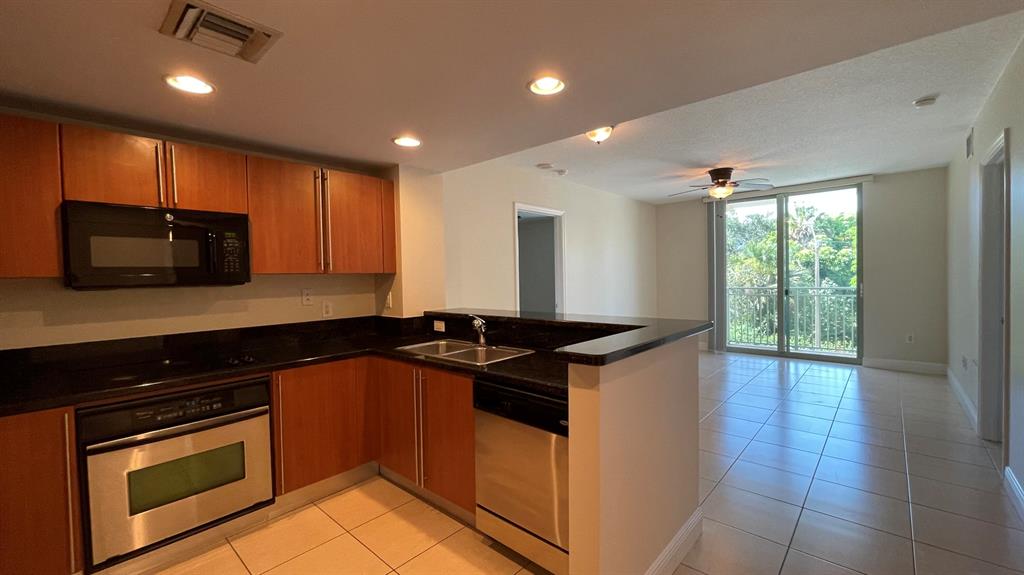 HIGHLY DESIRED DOWNTOWN WEST PALM BEACH 610 CLEMATIS BUILDING THIS TWO BEDROOM TWO BATH UNIT FEATURES TILE IN MAIN LIVING AREAS, CARPET IN BEDROOMS, IN-UNIT LAUNDRY, GRANITE COUNTERS & STAINLESS APPLIANCES. BALCONY WITH CITY VIEWS. AMENITIES INCLUDE CONCIERGE, GATED GARAGE PARKING, FITNESS CENTER, SAUNA, STEAM ROOM, 24-HOUR SECURITY, POOL, AND HOT TUB. BASIC CABLE AND WATER ARE INCLUDED IN THE RENT. PET FRIENDLY.