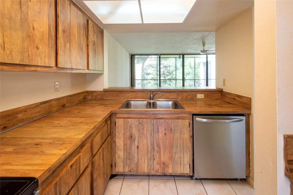 Photo of 8701 SW 30th Street #211, Davie, FL 33328 (MLS # B26043634)