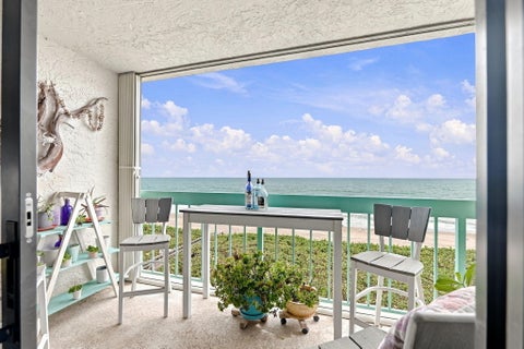 Photo of 9940 S OCEAN Drive #407, Jensen Beach, FL 34957 (MLS # B26083849)