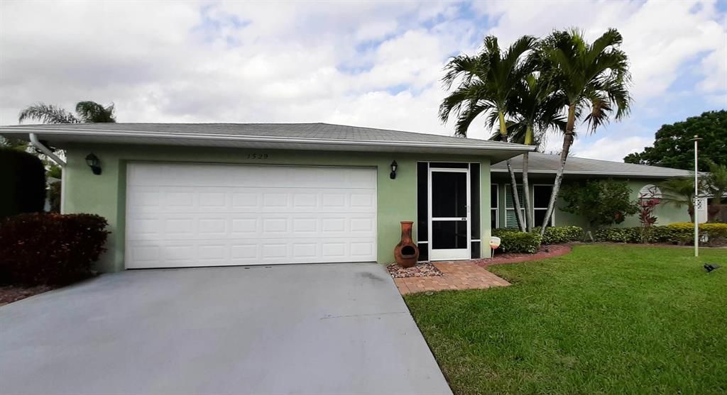 Photo of 1529 SE Pitcher Road, Port Saint Lucie, FL 34952 (MLS # R10761991)