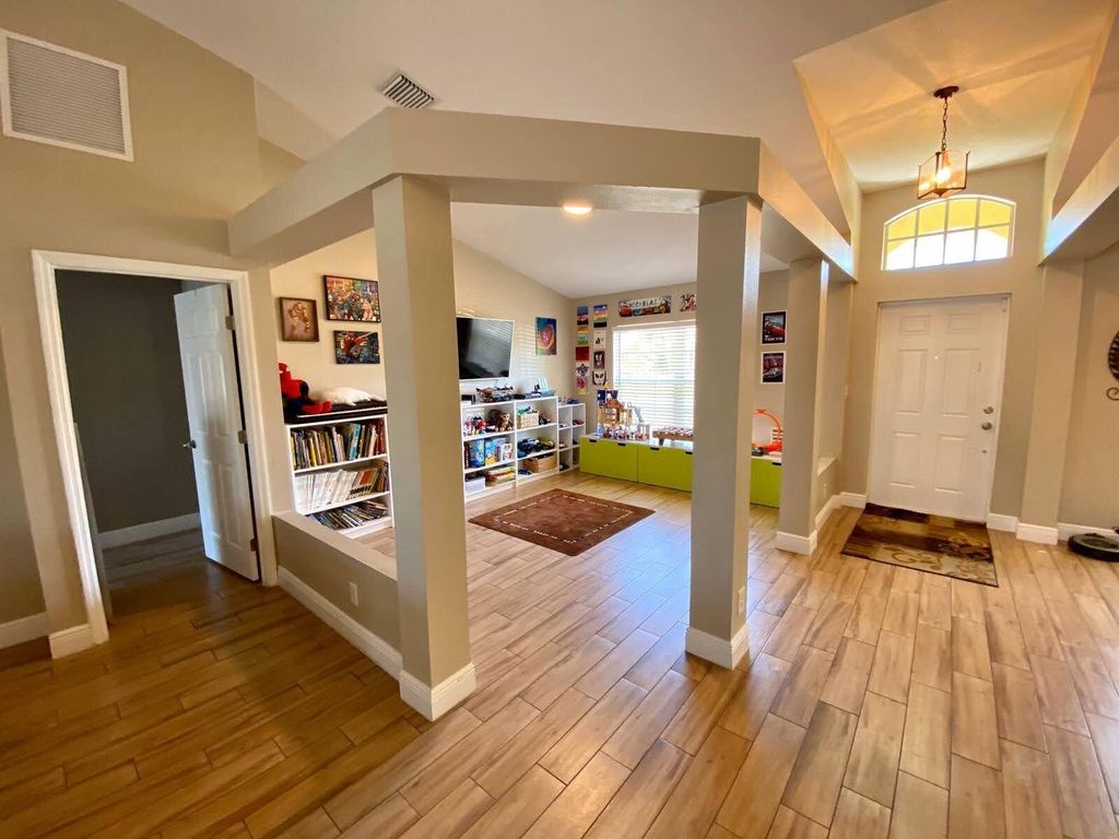 Photo of 501 SW Fifer Avenue, Port Saint Lucie, FL 34953 (MLS # B26016138)