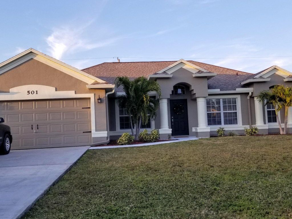 Photo of 501 SW Fifer Avenue, Port Saint Lucie, FL 34953 (MLS # B26016138)