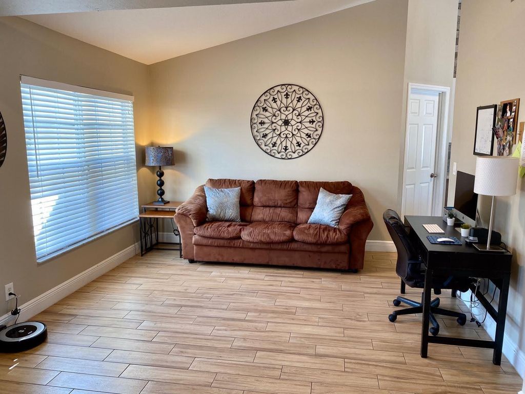 Photo of 501 SW Fifer Avenue, Port Saint Lucie, FL 34953 (MLS # B26016138)