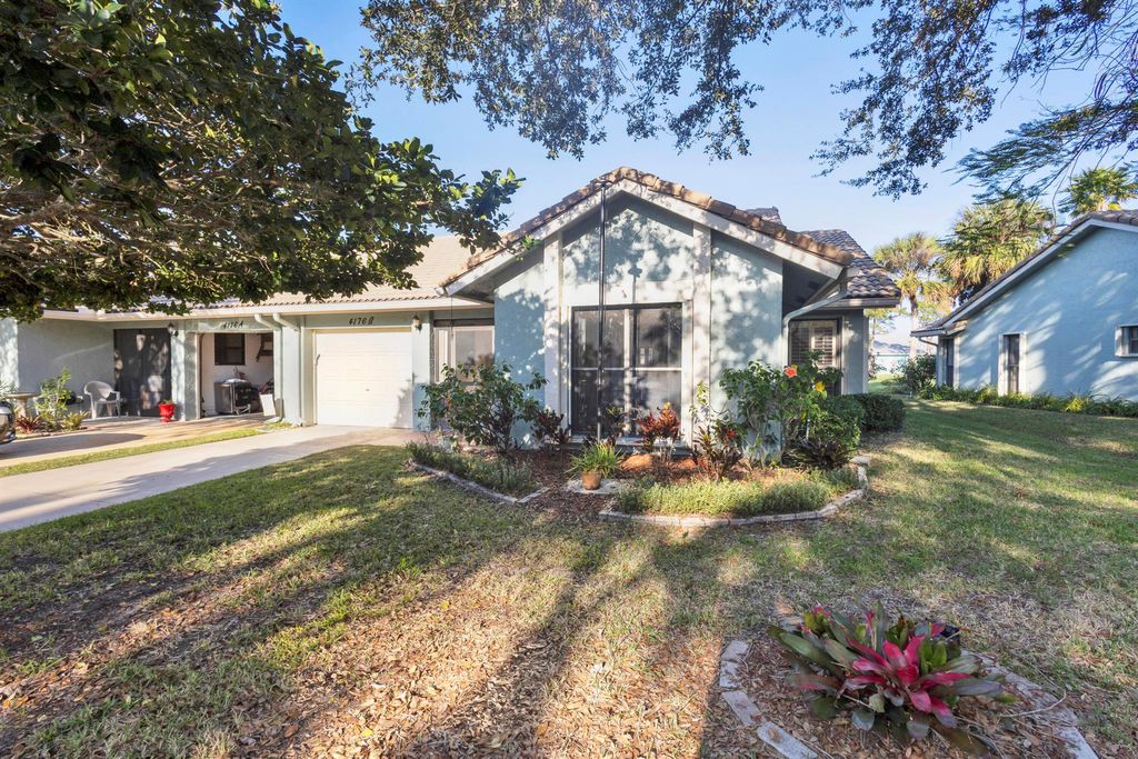 Photo of 4176 Gator Trace Villas Circle #B, Fort Pierce, FL 34982 (MLS # R11060835)