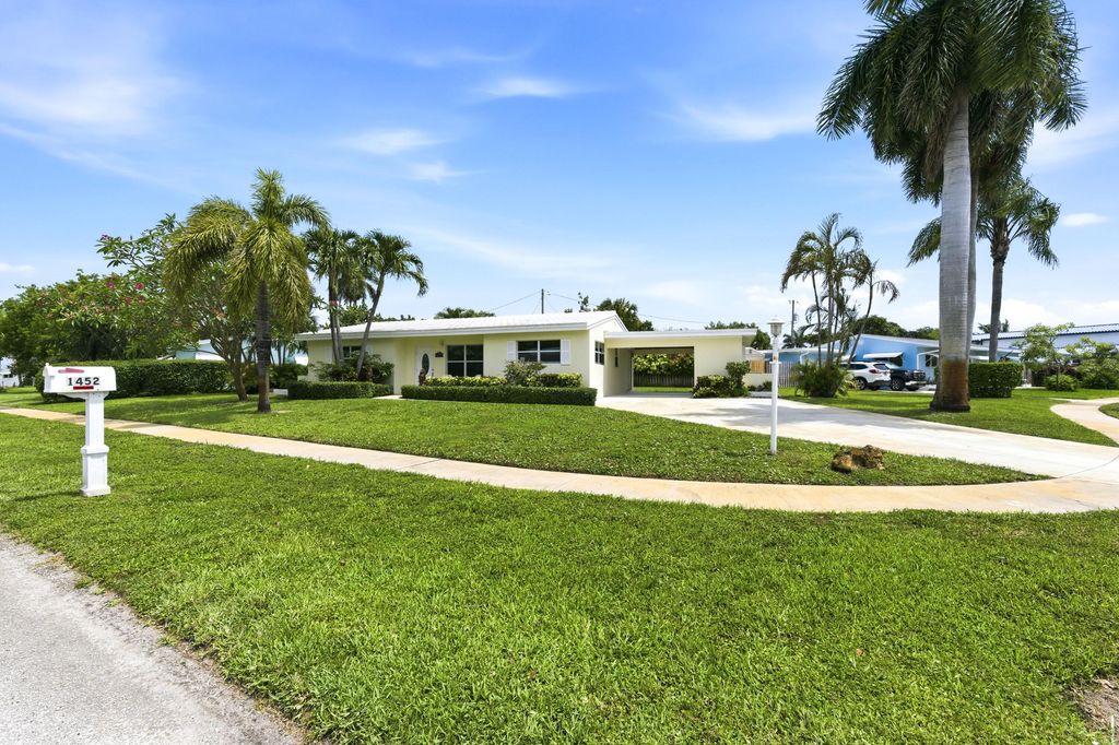 Photo of 1452 Crest Drive, Lake Worth, FL 33461 (MLS # B26028154)