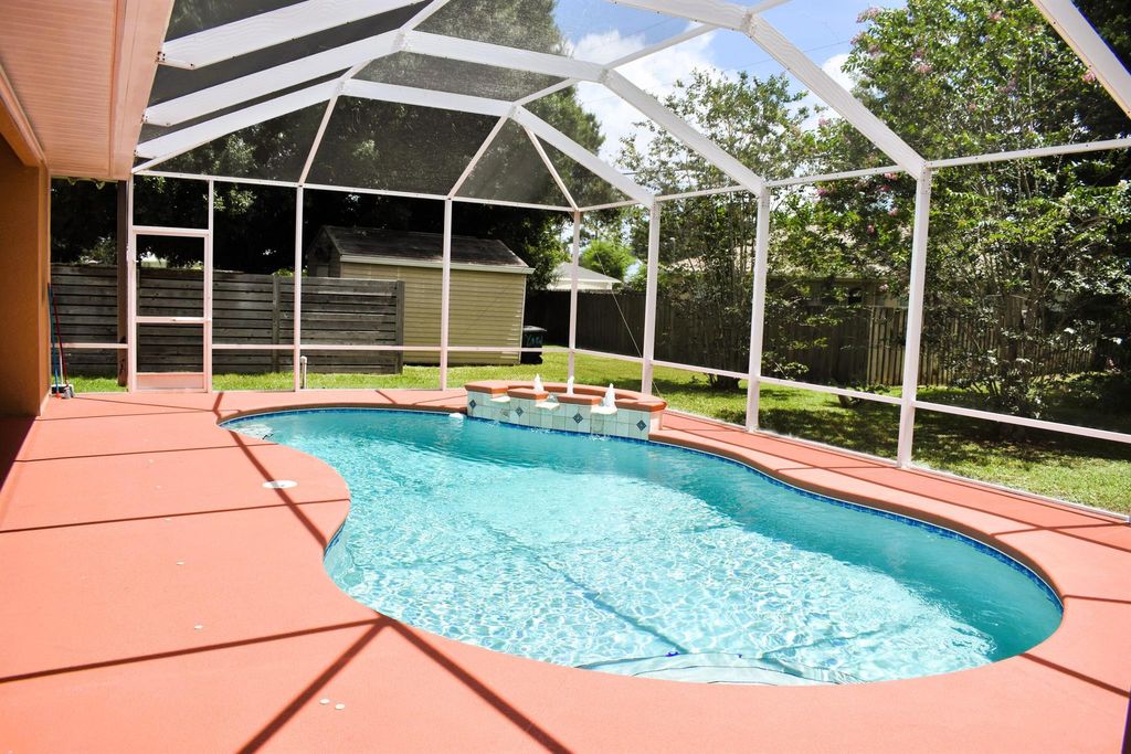 Photo of 1609 SE Ridgewood Street, Port St Lucie, FL 34952 (MLS # R11105816)