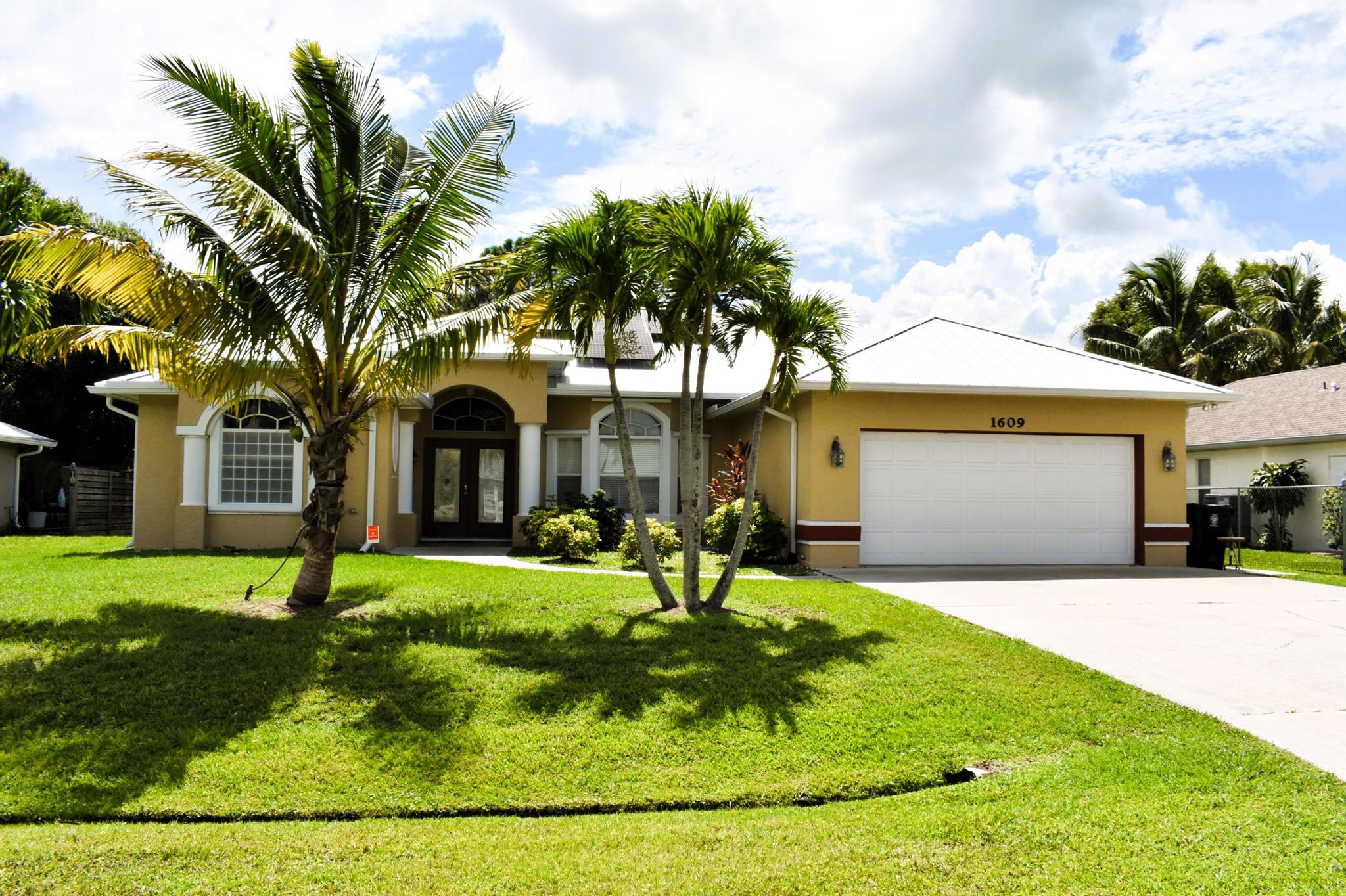 Beautiful 3 bed, 2.5 bath POOL CBS home! Landscaping and pool Maintenance included with rent. Renovated with a new roof and solar energy-efficient systems that will save you money on your electric bills. Freshly painted, this home checks all the boxes. The layout features split bedrooms with tile throughout the house and a screened lanai with a pool. Plus, *NO HOA! * The chef's kitchen is impressive, offering plenty of cabinets, quartz counters, stainless steel appliances, a breakfast nook, and a bar. The owner's suite is a retreat with a slider to the screened lanai, and the spa-like en-suite is massive with his and hers sinks, a Roman tub, and a shower. All this and so much more! Your new move-in-ready home is waiting. Conveniently located near beaches, restaurants, shopping,