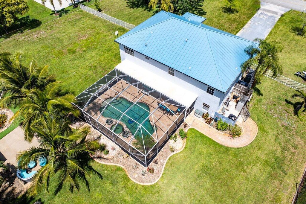 Photo of 13520 Temple Boulevard, The Acreage, FL 33412 (MLS # R11084573)