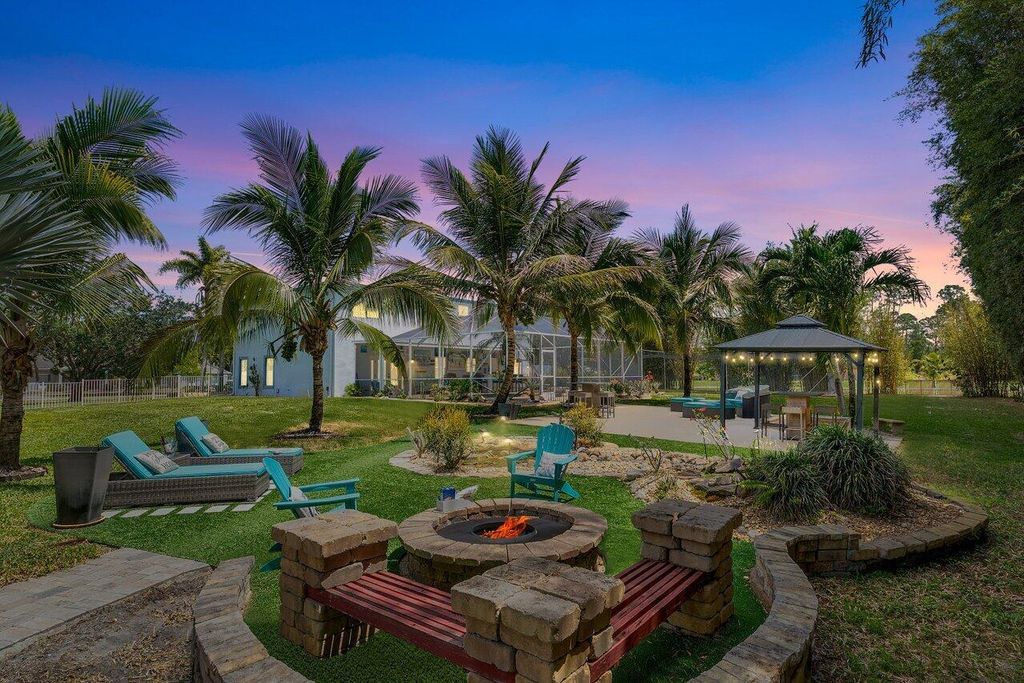 Photo of 13520 Temple Boulevard, The Acreage, FL 33412 (MLS # R11084573)