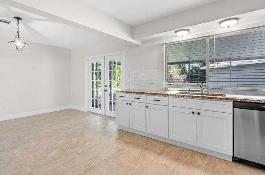 Photo of 643 NW Grenada Street, Port Saint Lucie, FL 34983 (MLS # B26005468)