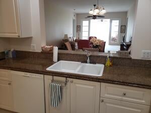 Photo of 27 HARBOUR ISLE Drive W #305, Fort Pierce, FL 34949 (MLS # B26066436)