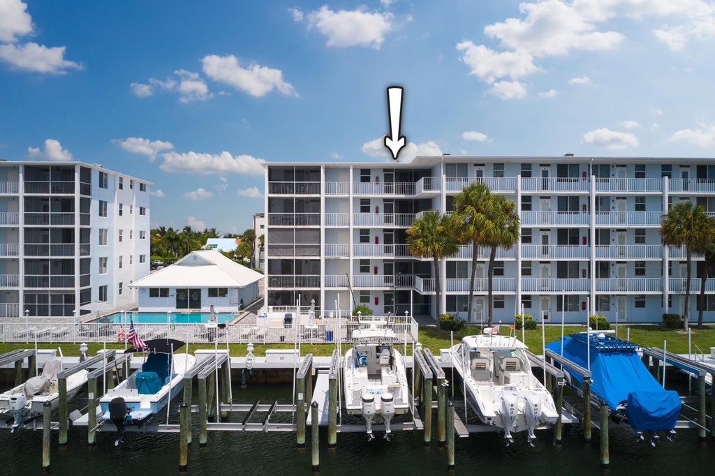 Photo of 104 Paradise Harbour Boulevard #402, North Palm Beach, FL 33408 (MLS # B26075400)