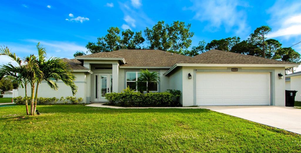 Photo of 2102 SW Alloway Avenue, Port Saint Lucie, FL 34953 (MLS # R10941771)