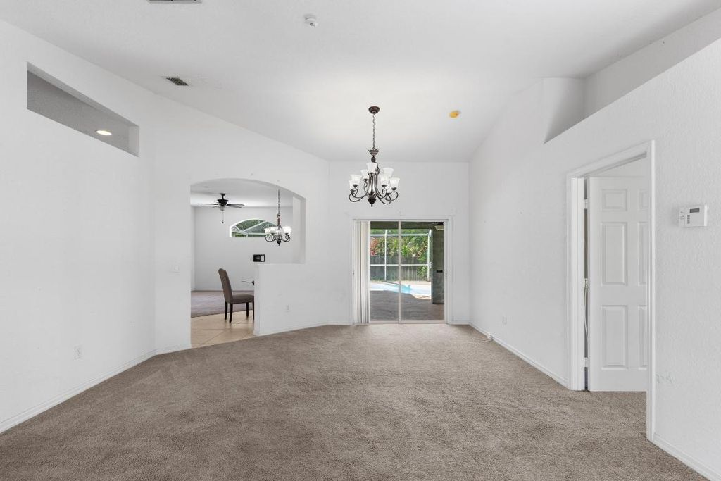 Photo of 1042 SW Janette Avenue, Port Saint Lucie, FL 34953 (MLS # R11101894)