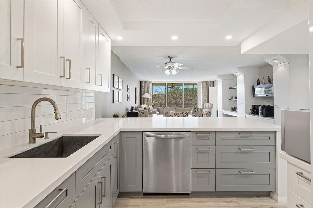 Photo of 4030 W Palm Aire Drive #301, Pompano Beach, FL 33069 (MLS # F10490305)