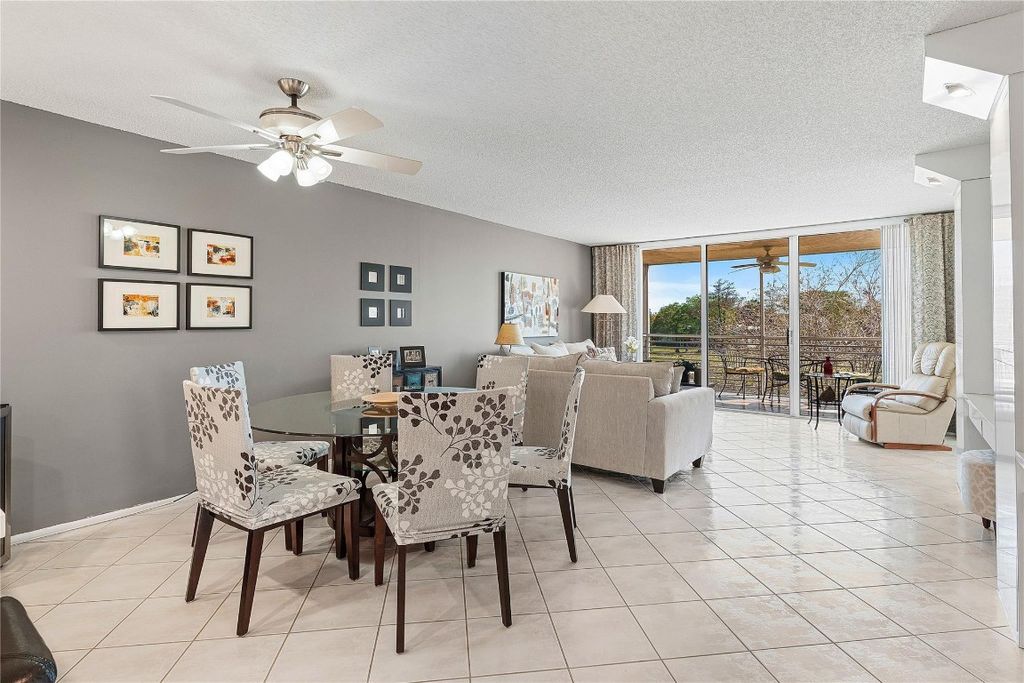 Photo of 4030 W Palm Aire Drive #301, Pompano Beach, FL 33069 (MLS # F10490305)