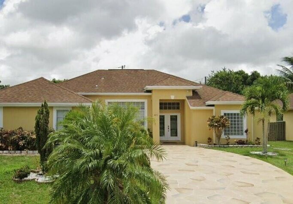Photo of 485 SW Dagget Ave, Port Saint Lucie, FL 34953 (MLS # B26032466)