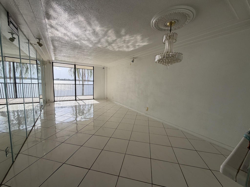 Photo of 112 LAKE EMERALD Drive #203, Oakland Park, FL 33309 (MLS # B26076309)
