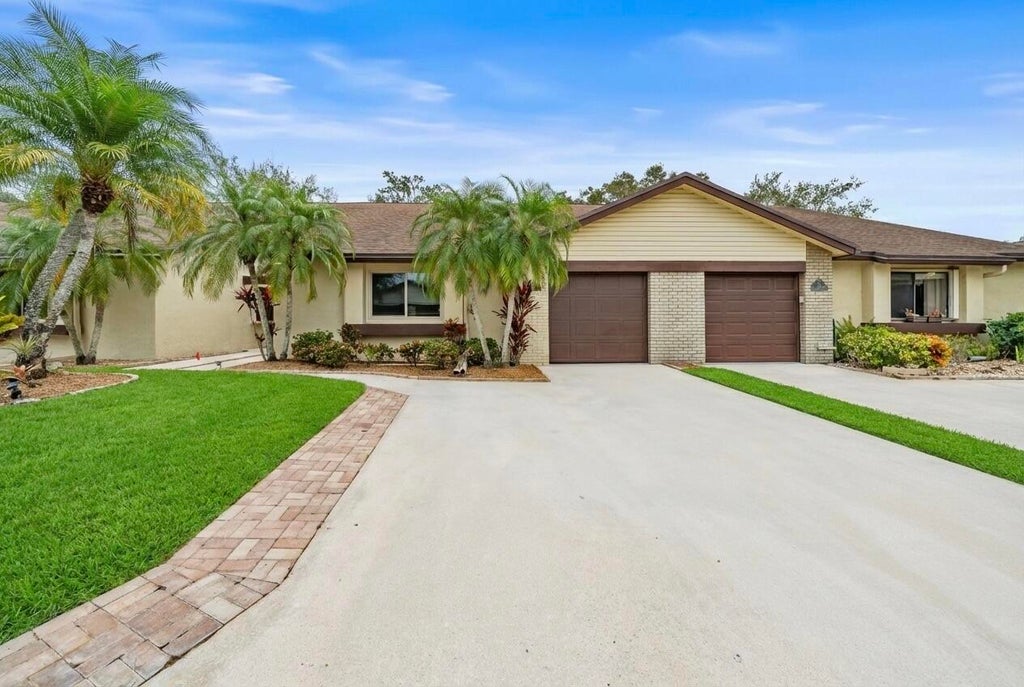 Photo of 137 MEANDER Circle, Royal Palm Beach, FL 33411 (MLS # B26085466)