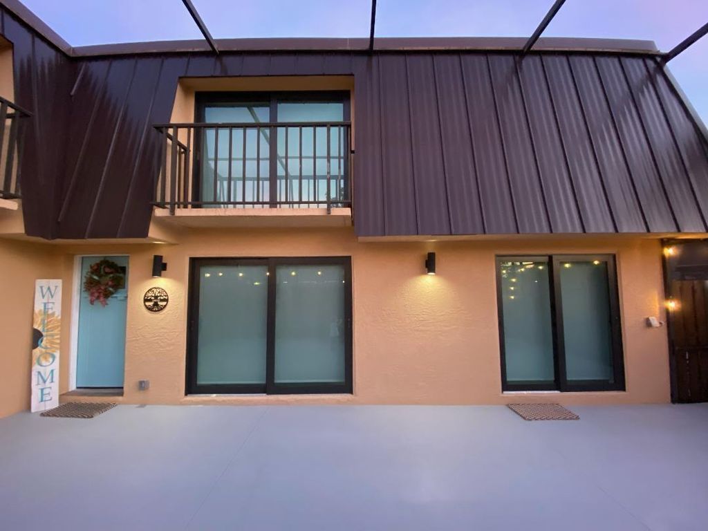 Photo of 5867 SE Windsong Lane #813, Stuart, FL 34997 (MLS # F10413177)