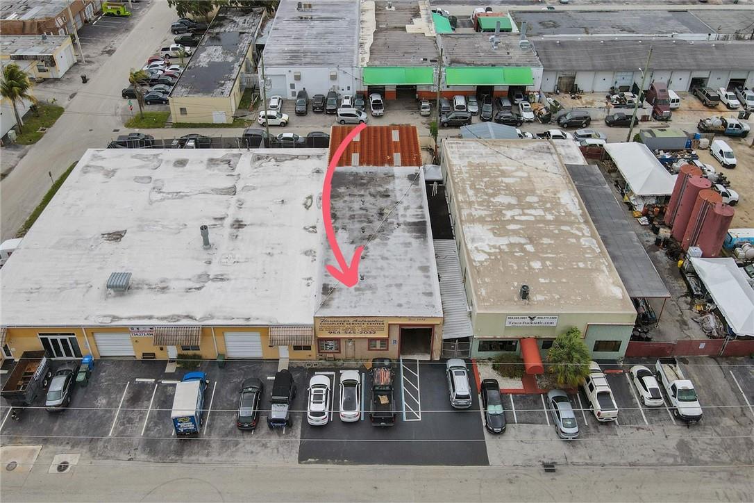 Ready to take your business to the next level? This spacious 4,492-square-foot warehouse is the perfect space for you! With a 40' x 34' covered area with alley access and a 52' x 10' covered section for parking, this warehouse is reliable and durable with its sturdy CBS and concrete roof construction. Situated in a prime location with easy access to I-95 and N Dixie Hwy, this property is zoned for light industrial use, offering endless potential uses. You'll find a private, air-conditioned office, two restrooms, a storage room, mezzanine storage space, and more. With 3 roll-up doors and a clear ceiling height of 13' 8'', this warehouse is ready to meet your business needs. IMPORTANT - I ask that you please don't DISTURB OCCUPANTS/STAFF. ALL SHOWINGS BY APPOINTMENT ONLY.