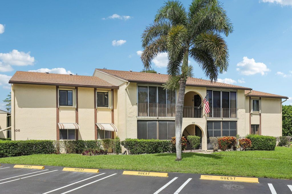 Photo of 306 Knotty Pine Circle #A-2, Greenacres, FL 33463 (MLS # B26030732)