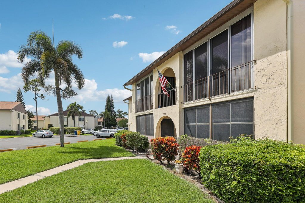 Photo of 306 Knotty Pine Circle #A-2, Greenacres, FL 33463 (MLS # B26030732)