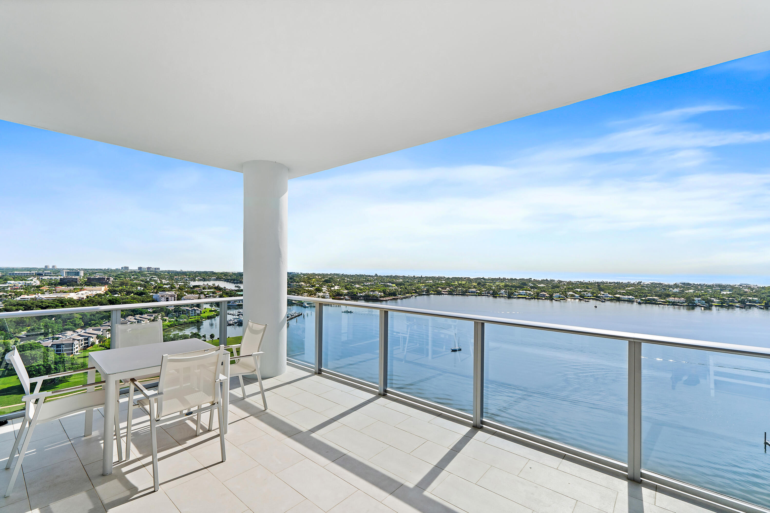 The Eagle's Nest Above the SeaWater Club Penthouse 2204 - Building OneElevated high atop the 22nd floor the pinnacle of Water Club's most exclusive tower this is not just a penthouse. It's a sanctuary in the sky, offering nearly 3,000 square feet of sophisticated coastal luxury with sweeping, unobstructed views of the Atlantic Ocean, Intracoastal Waterway, and endless horizon. A true 'Eagle's Nest' located at the north head of Lake Worth, this residence is designed for those who seek elegance with altitude.Step inside and be welcomed by floor-to-ceiling glass walls that flood the open living spaces with natural light. The expansive layout blurs the line between indoors and out, inviting the horizon into your everyday experience. Every inch has been meticulously