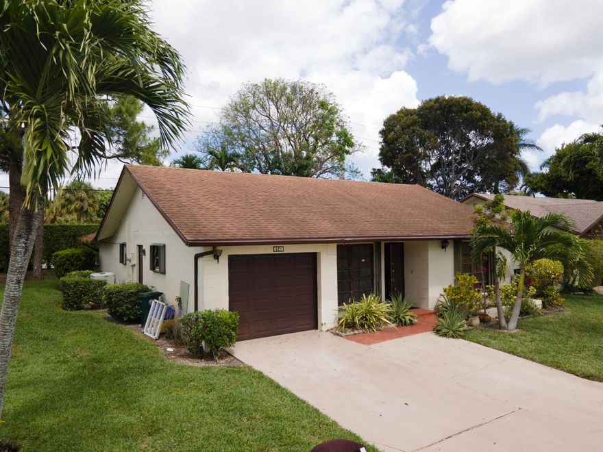 2BR/2BA home with enclosed sitting room --offering additional flexible living space. Spilt bedroom plan with open layout with vaulted ceilings. This property presents a great opportunity for buyers to personalize and update to their taste, with mostly cosmetic improvements needed to unlock its full potential. Master Bathroom and Kitchen updated.   Located in a well-situated, active community featuring a large clubhouse, pool, scenic walking paths, and multiple bench seating areas throughout  perfect for enjoying the neighborhood lifestyle. Please text Julie Joseph at (561)633-8470 for showing instructions.