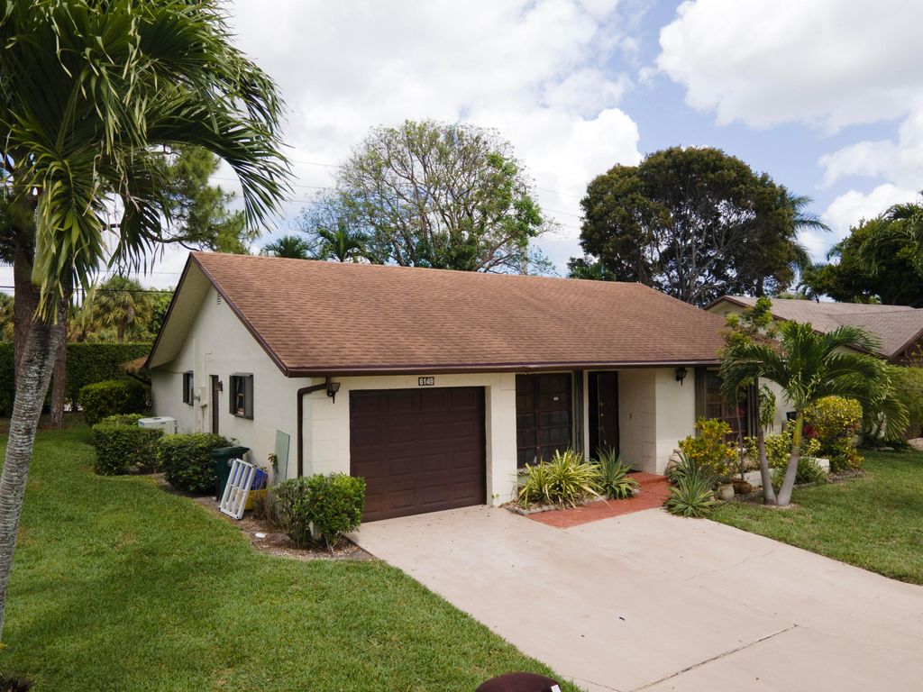Photo of 6149 Olivewood Circle, Greenacres, FL 33463 (MLS # B26021202)