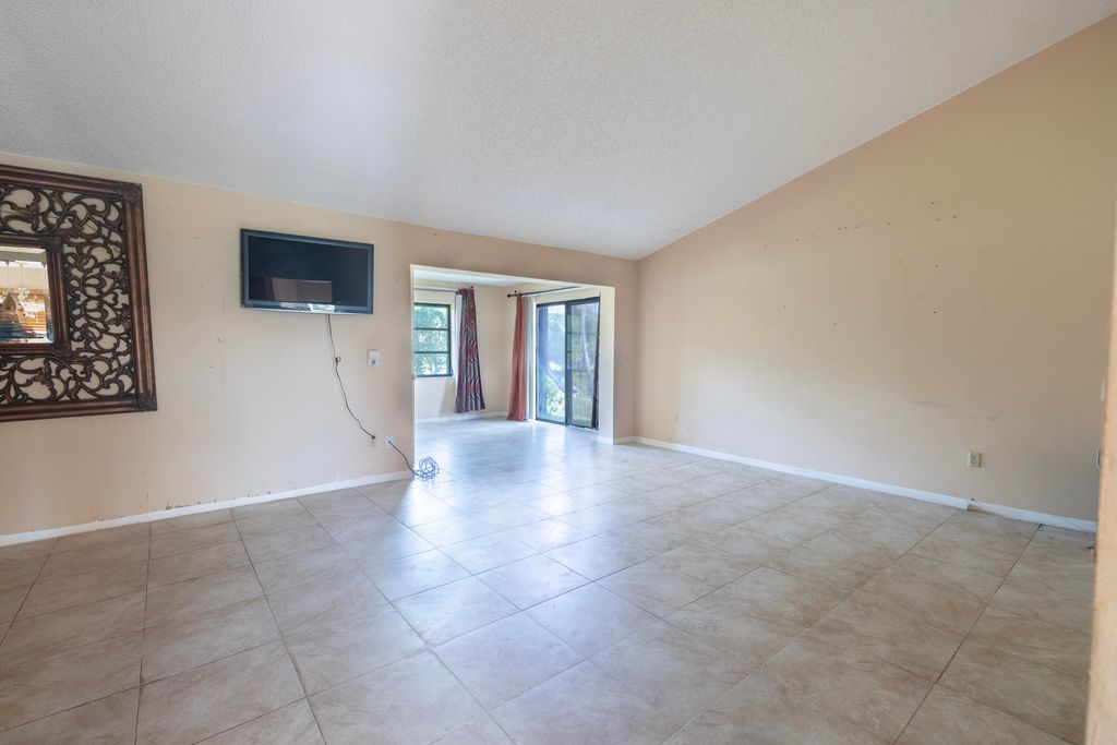 Photo of 6149 Olivewood Circle, Greenacres, FL 33463 (MLS # B26021202)