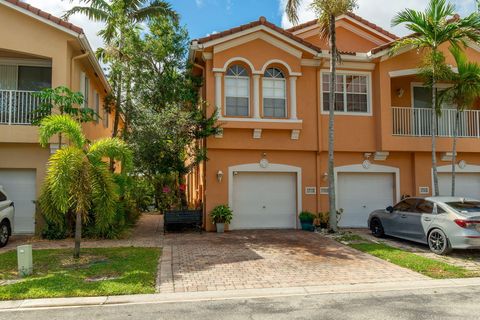 Photo of 1710 Terra Cotta Drive, Riviera Beach, FL 33404 (MLS # R11127977)
