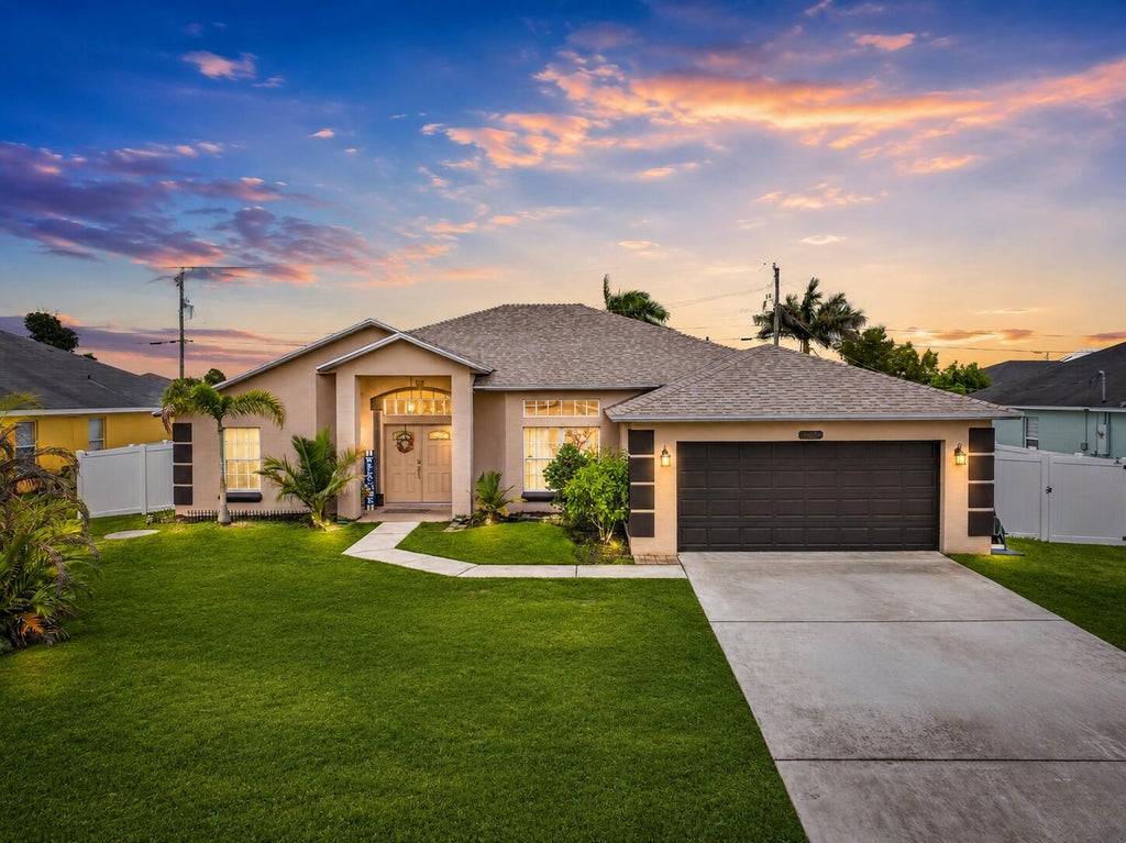 Photo of 1929 SW Breezeway Street, Port Saint Lucie, FL 34987 (MLS # B26061393)