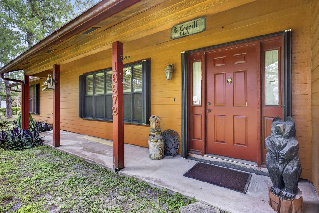 Photo of 16972 W Derby Drive W, Loxahatchee, FL 33470 (MLS # B26058937)