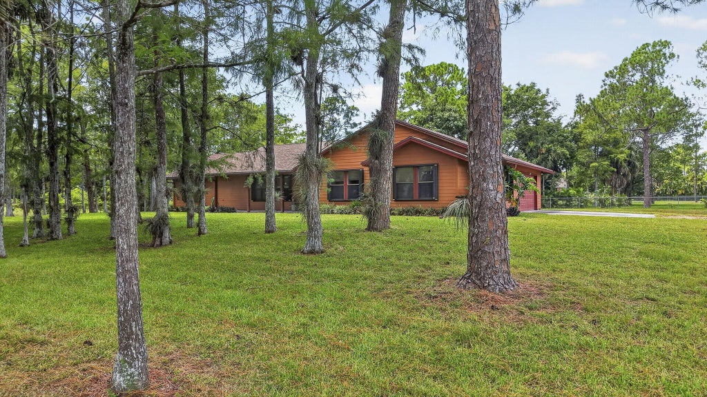 Photo of 16972 W Derby Drive W, Loxahatchee, FL 33470 (MLS # B26058937)