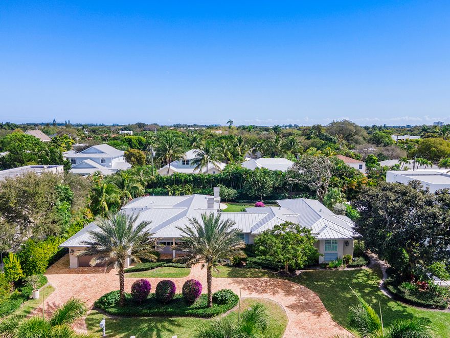 LIKE NEW, BREATHTAKING, COSTAL CONTEMPORARY RE BUILT 2016-2017COMPLETE RECONSTRUCTION. OVER SIZED PARK LIKE SETTING LOT,SE EXPOSURE,RESORT STYLE OUT DOOR LIVING WITH, SALT WATER POOL & SPA,PATIO FIREPLACE &  SUMMER KITCHEN,FULL HOUSE HURRICANE PROTECTION,IMPACT WINDOWS AND DOORS,HURRICANE STRAPPINGS,FULL HOUSE GENORATOR,4 BEDROOM, PLUS DEN,4 BATH RMS,OVERSIZED LAUNDRY ROOM,DOUBLE WASHER AND DRYER,CHEF'S KITCHEN WITH DUAL VIKING RANGE AND DUAL DISHWASHERS,VIKING REFRIGORATOR 2 VIKING DISH WASHERS,NATURAL GAS COOK TOP AND DUAL ELEC OVENS, PLUS 2 MONOGRAM UNDER COUNTER WINE COOLERS, PLUS A GEORGOUS 5 FT X12 FT MARBLE ISLAND COUNTER TOP WITH COUNTER TOP SEATING FOR 6 AND STORAGE UNDERNEATH.