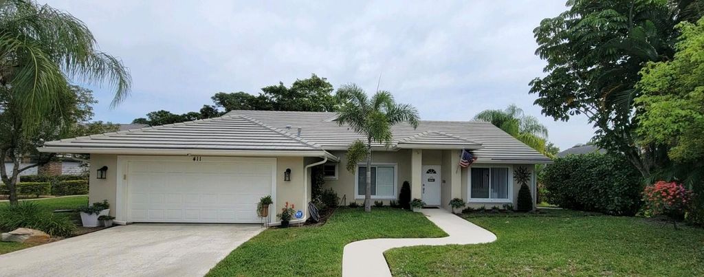 Photo of 411 SW Redwood Cove, Port Saint Lucie, FL 34986 (MLS # R10970605)