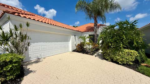 Photo of 13151 Crisa Drive, Palm Beach Gardens, FL 33410 (MLS # B26041496)