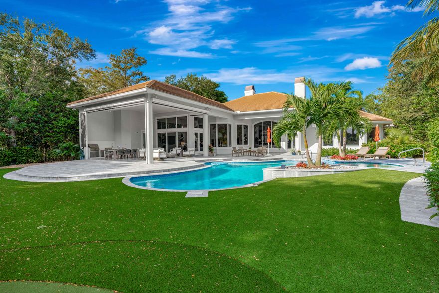 Discover refined living in the exclusive gated golf community of Old Marsh. Perfectly positioned on ¾ of an acre with stunning eastern-facing views, this 5,000 sq. ft., 4-bedroom residence has been fully renovated and move-in ready.

Step inside to fresh new flooring that creates a warm California-inspired vibe, while outdoors, a brand-new summer kitchen with phantom screens sets the stage for effortless entertaining. The home's private setting is enhanced by preserve on one side and lush tropical landscaping throughout, creating a serene retreat.

Enjoy the convenience of a low-maintenance artificial turf yard complete with a putting green, perfect for both fun and relaxation.

As a resident of Old Marsh Golf Club, you'll experience one of South Florida's most coveted - more... communities, home to a signature Pete Dye course and an intimate, world-class club lifestyle.

A rare opportunity to own a move-in ready in one of Palm Beach County's true hidden gems.