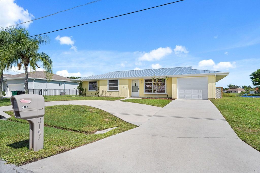 Photo of 2167 SE Sunflower Street, Port Saint Lucie, FL 34952 (MLS # R11135144)