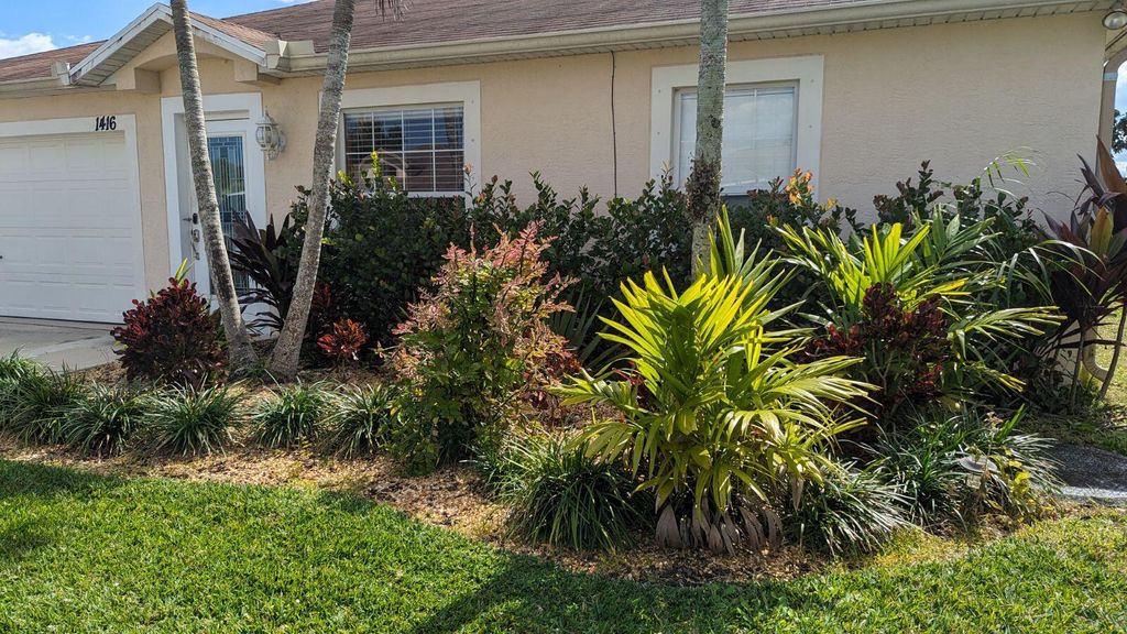 Photo of 1416 SW Bartell Avenue, Port Saint Lucie, FL 34953 (MLS # R10978145)
